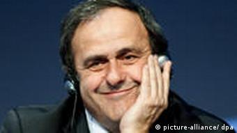 Smiling UEFA President Michel Platini