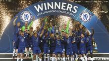 Soccer Football - Champions League Final - Manchester City v Chelsea - Estadio do Dragao, Porto, Portugal - May 29, 2021 Chelsea players celebrate with the trophy after winning the Champions League Pool via REUTERS/Pierre-Philippe Marcou